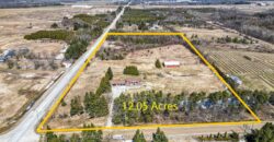 stunning, one-of-a-kind detached home sits on a 12.05-acre corner lot at County Road