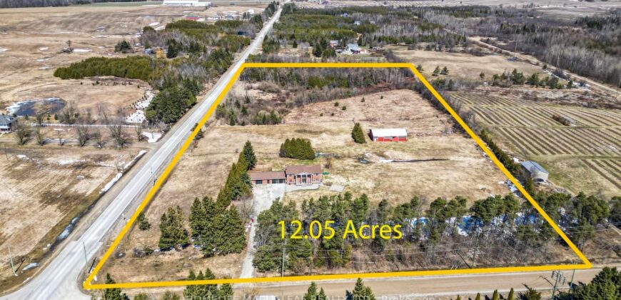stunning, one-of-a-kind detached home sits on a 12.05-acre corner lot at County Road